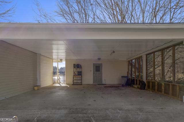 view of parking with a carport