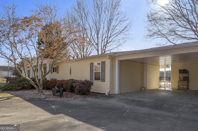 view of front of property with a carport