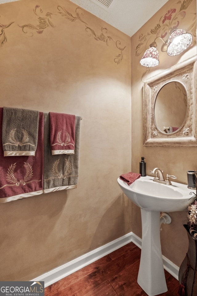 bathroom featuring hardwood / wood-style floors