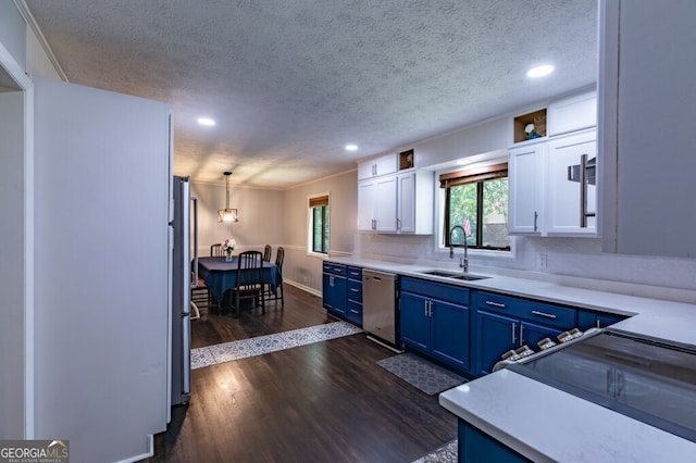 kitchen with white cabinetry, blue cabinetry, decorative light fixtures, sink, and stainless steel dishwasher