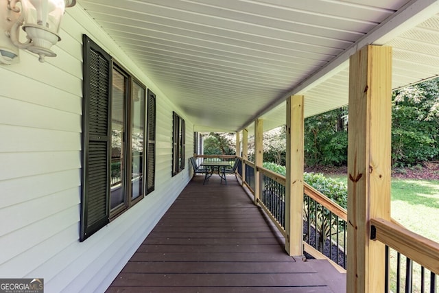 wooden terrace with covered porch