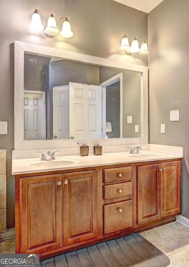 full bath featuring double vanity and a sink