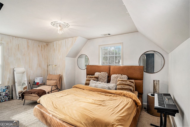 bedroom featuring carpet and lofted ceiling