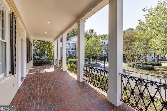 view of patio featuring a porch