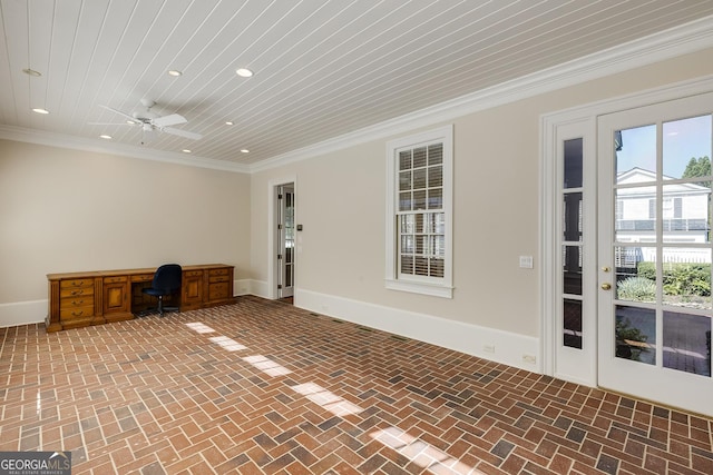 spare room with ceiling fan, wood ceiling, and crown molding