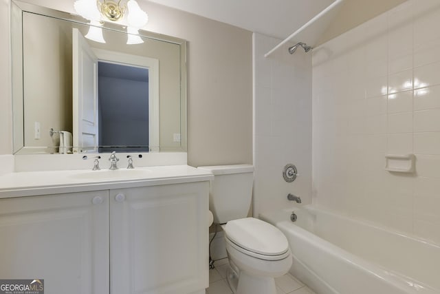 full bathroom featuring tile patterned floors, vanity, toilet, and tiled shower / bath