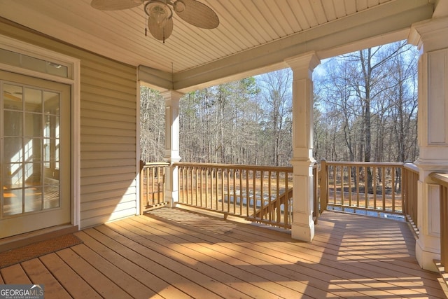 wooden terrace with ceiling fan