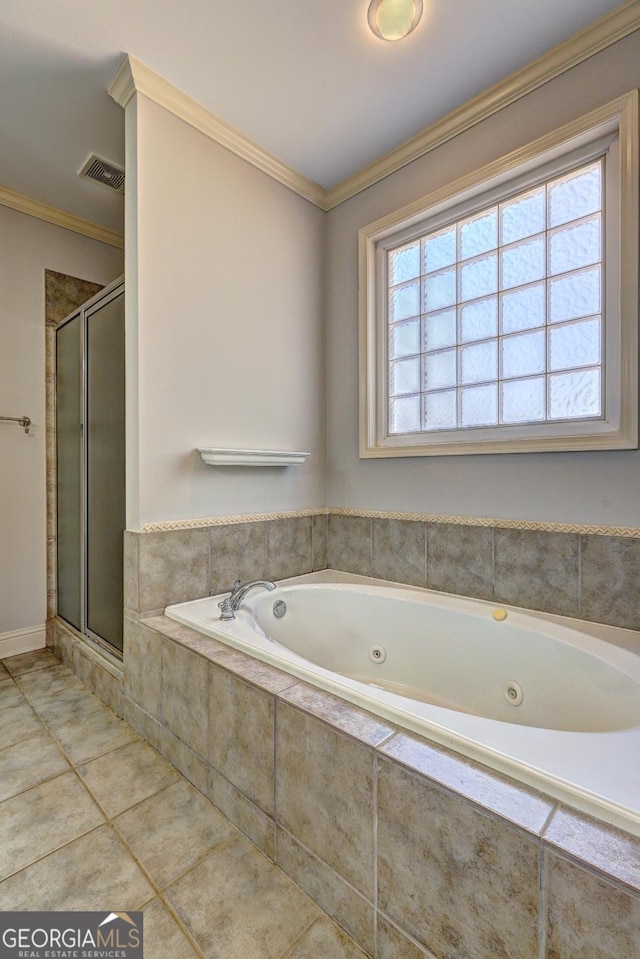 bathroom with ornamental molding, a healthy amount of sunlight, and tile patterned floors