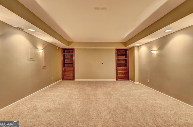 interior space featuring built in shelves, recessed lighting, carpet flooring, and baseboards