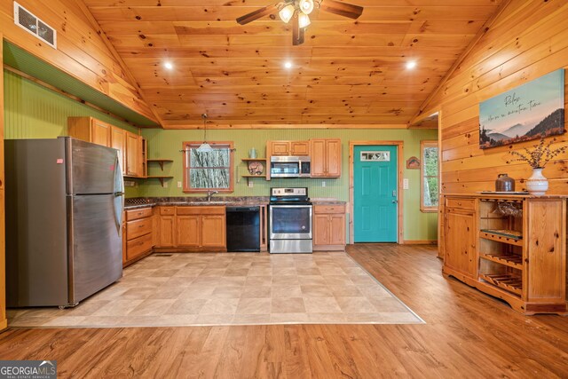 kitchen with open shelves, stainless steel appliances, vaulted ceiling, and visible vents