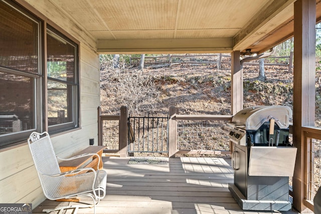 wooden deck with area for grilling