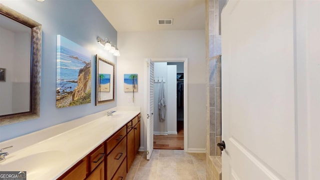 bathroom with vanity and tile patterned floors