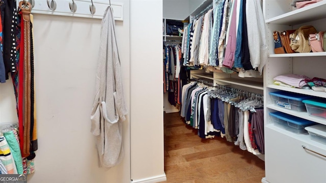 walk in closet featuring light wood-type flooring