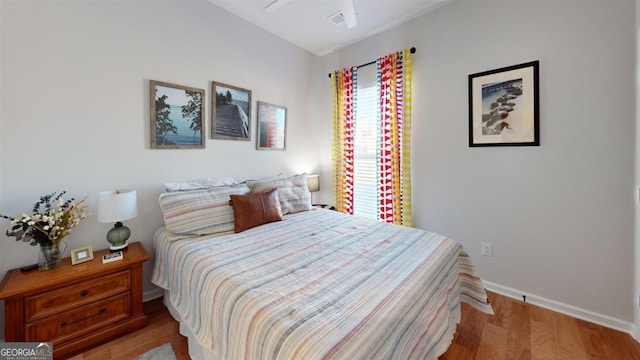 bedroom featuring light wood-type flooring