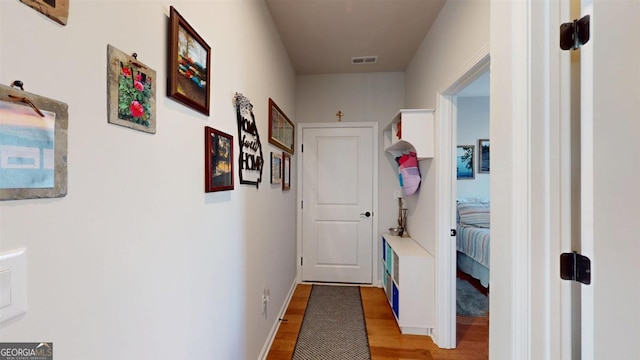 hall featuring hardwood / wood-style floors