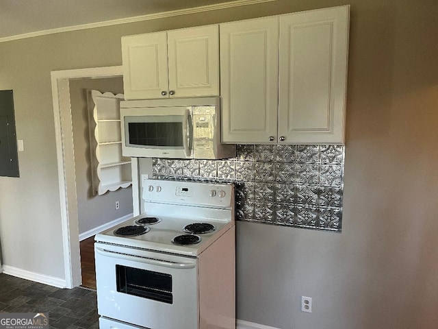 kitchen with white appliances, white cabinetry, baseboards, ornamental molding, and electric panel