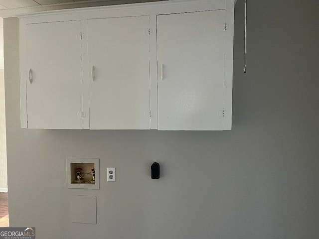 laundry area with cabinet space, washer hookup, and hookup for an electric dryer