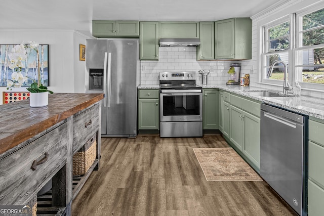 kitchen featuring green cabinetry and appliances with stainless steel finishes