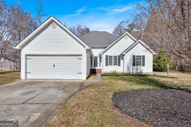 single story home with a front yard and a garage