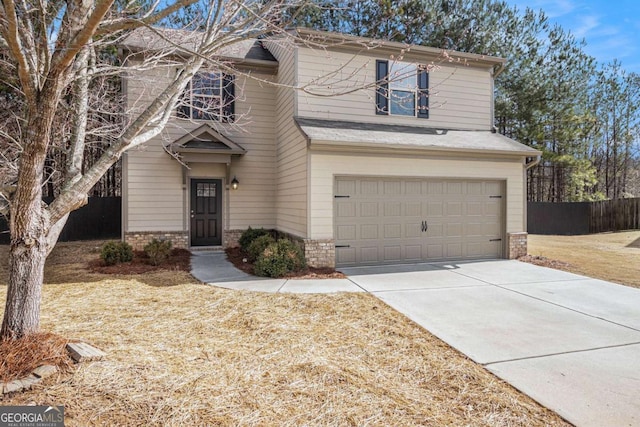 front of property with a garage