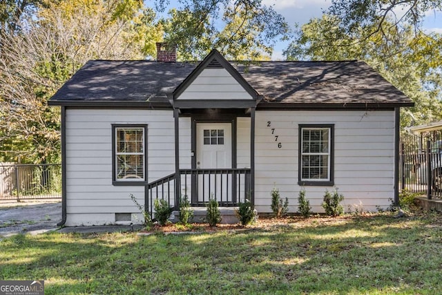 view of front of house with a front yard