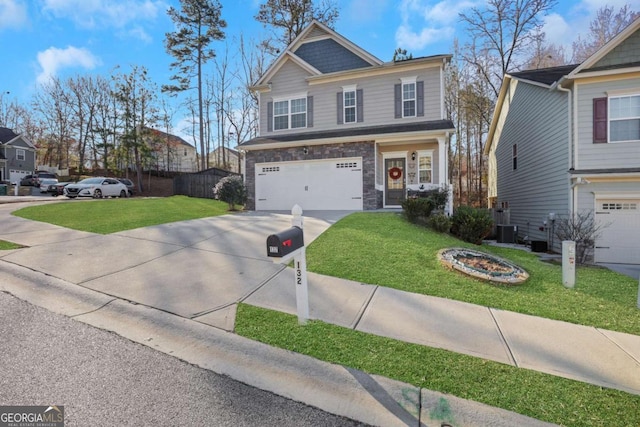 view of front of house with a garage, central air condition unit, and a front lawn