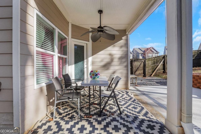 view of patio featuring ceiling fan