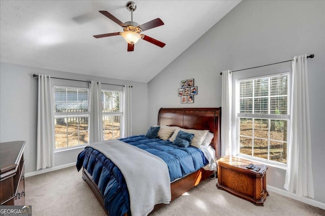 bedroom with lofted ceiling, carpet, baseboards, and ceiling fan