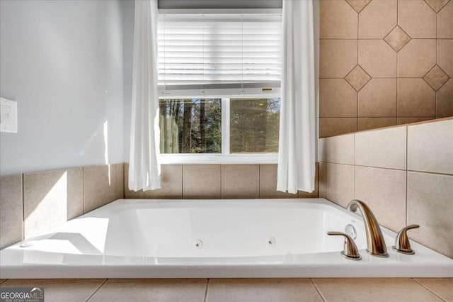bathroom with a whirlpool tub