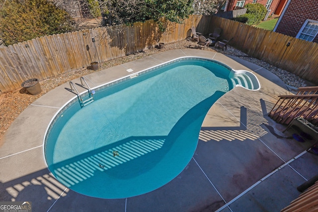 view of pool with a fenced in pool and a fenced backyard