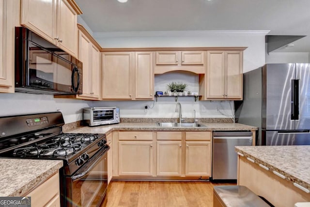 kitchen with light wood-type flooring, black appliances, sink, ornamental molding, and light brown cabinets