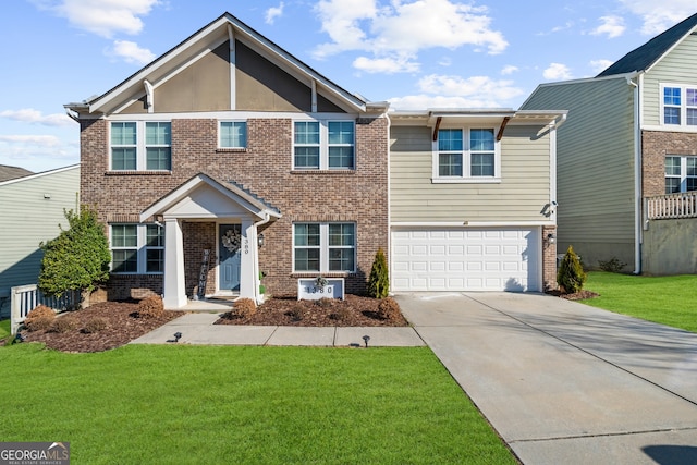 view of front of home featuring an attached garage, brick siding, driveway, and a front lawn