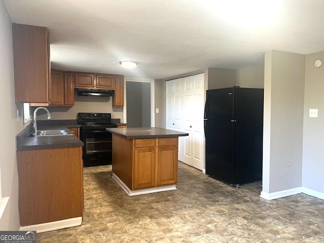 kitchen with a kitchen island, sink, and black appliances