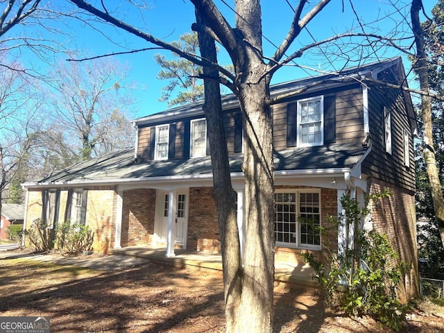 view of front of home featuring covered porch