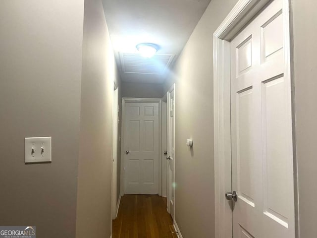 hallway featuring dark hardwood / wood-style floors