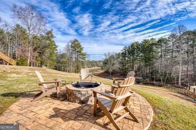 view of patio featuring a fire pit