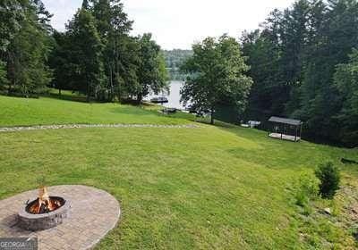 view of yard featuring a fire pit