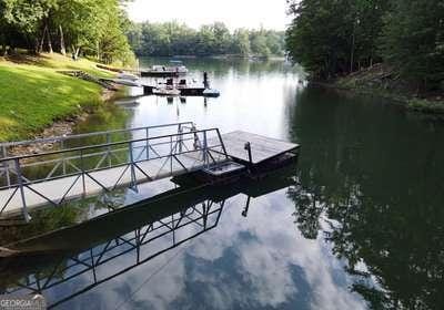 view of dock with a water view