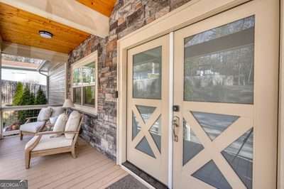 entrance to property featuring french doors