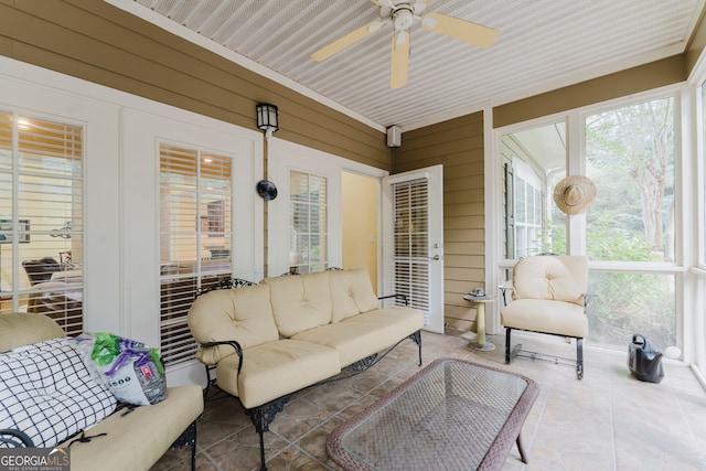 sunroom / solarium with ceiling fan