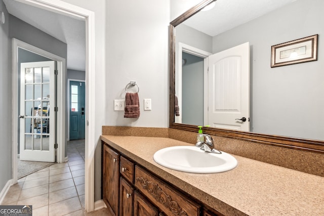 bathroom featuring vanity and tile patterned floors