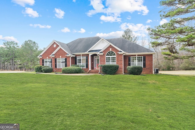 ranch-style home with a front lawn