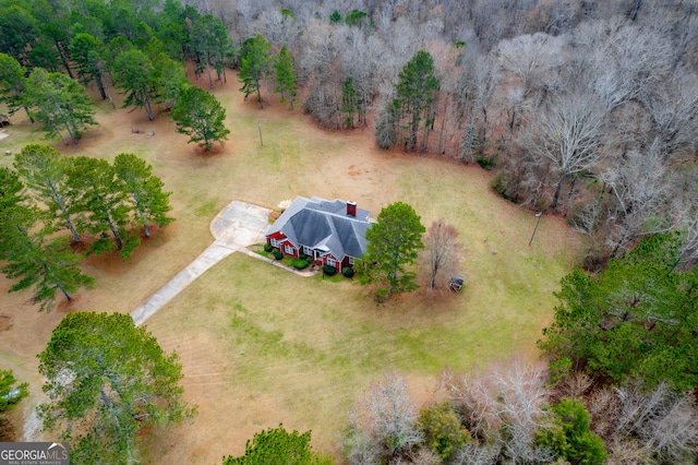 birds eye view of property with a rural view