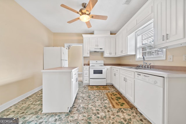 kitchen featuring white appliances, ceiling fan, a center island, sink, and white cabinetry