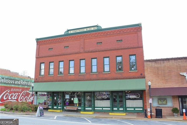 view of building exterior featuring central air condition unit