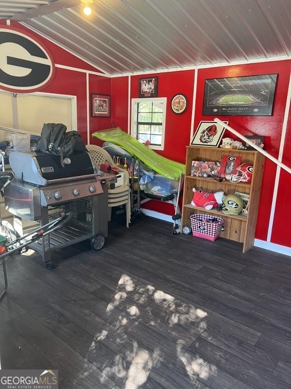 11 Plantation Dr, Swainsboro, GA 30401 - interior space with dark wood-style floors and lofted ceiling