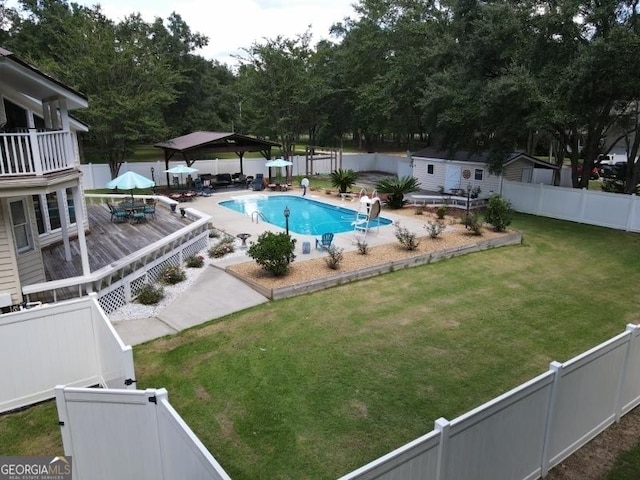 11 Plantation Dr, Swainsboro, GA 30401 - view of pool featuring a deck, a fenced backyard, a gazebo, a yard, and a fenced in pool