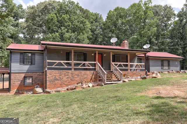 ranch-style house featuring a front lawn and a porch