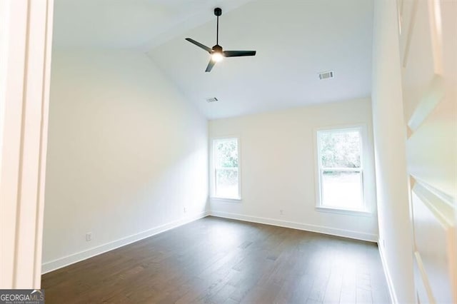 unfurnished room featuring dark hardwood / wood-style flooring, ceiling fan, high vaulted ceiling, and a wealth of natural light