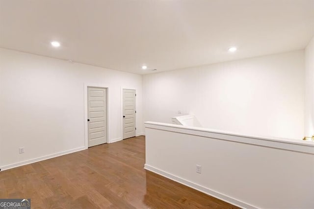 empty room featuring hardwood / wood-style floors